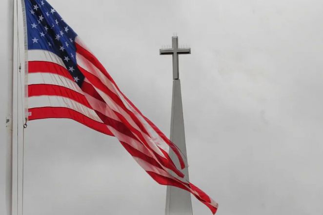image:Image 13/source/orig/12594_9685_0_religious_freedom_flag_cross_credit_amanda_wayne_shutterstock_cna.jpg